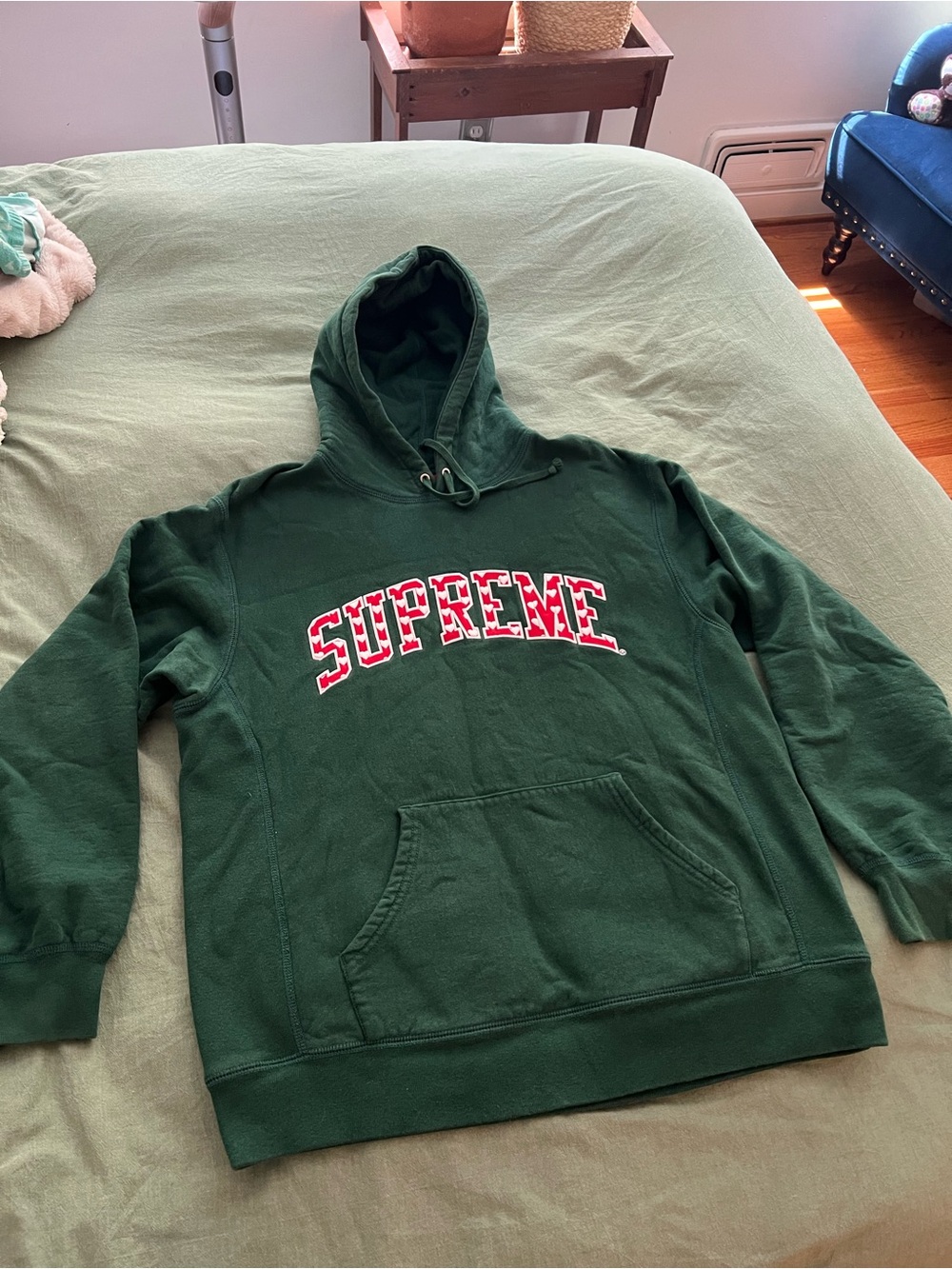 Supreme Dark Green Hoodie with Red Tag